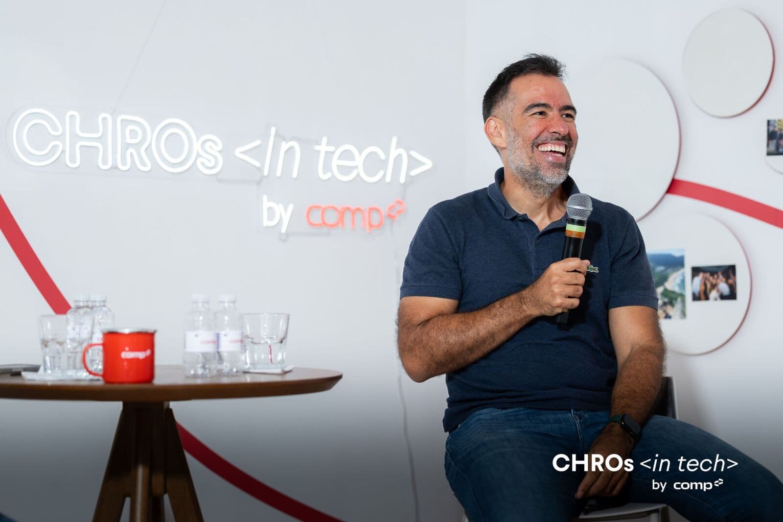 Guest smiling during an on-stage conversation
